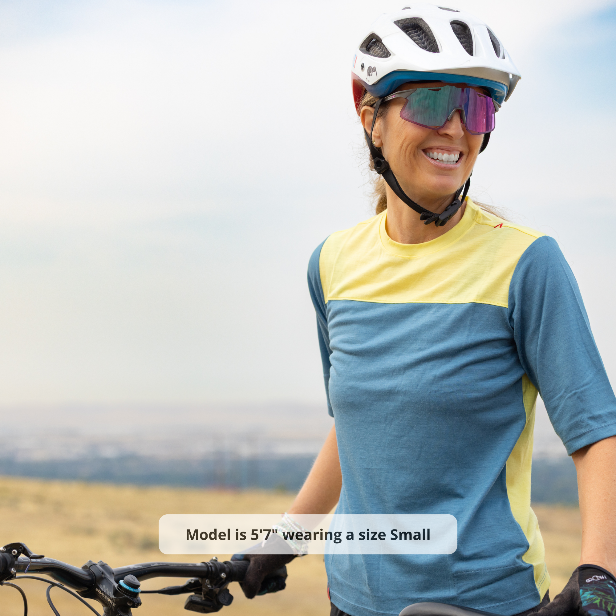 Raw Style women’s One Quiver merino MTB jersey short sleeve two-tone Spruce Limoncello, model front view